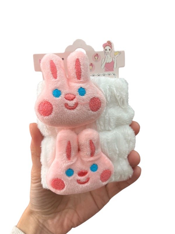 Producto - Muñequera conejo blanco