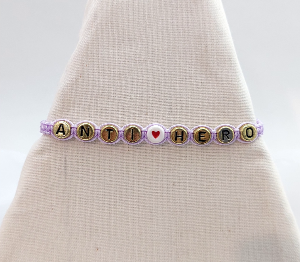 Producto - Pulsera ANTI HERO lila y dorado