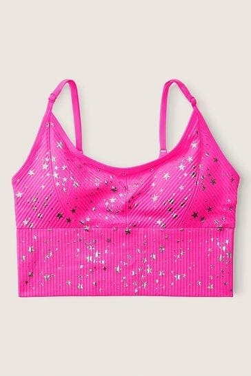 Producto - top pink fucsia fluo con estrellitas plateadas talle M
