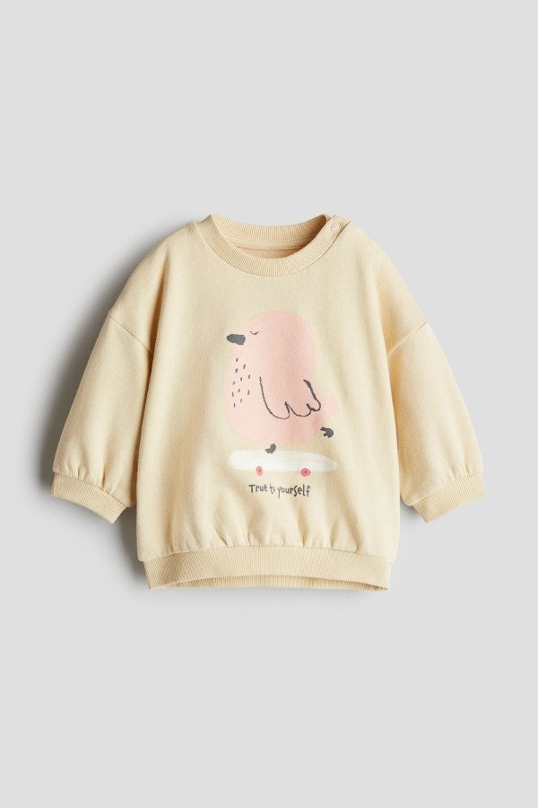 Producto - Buzo HyM pajarito natural