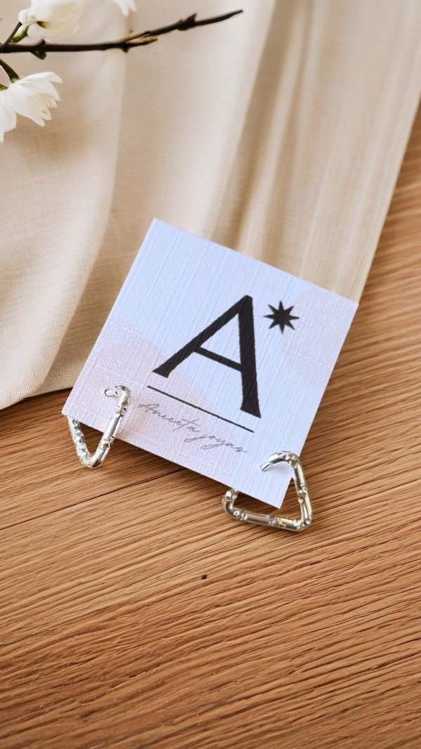 Producto - Aritos triángulos ACERO BLANCO AA176