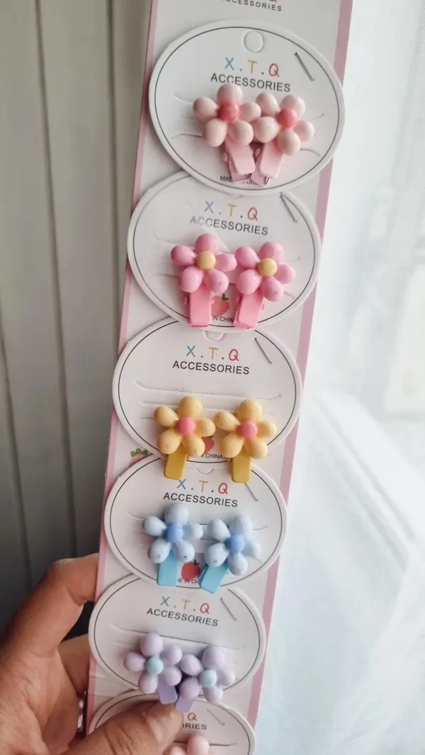 Producto - Pinzas por par florcitas agarra pelusa