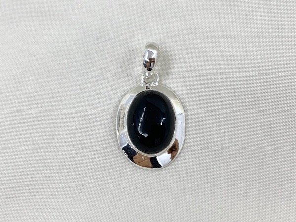 Producto - Dije de plata con ONIX