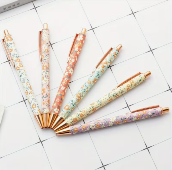 Producto - LAPICERAS DORADAS CON FLORES