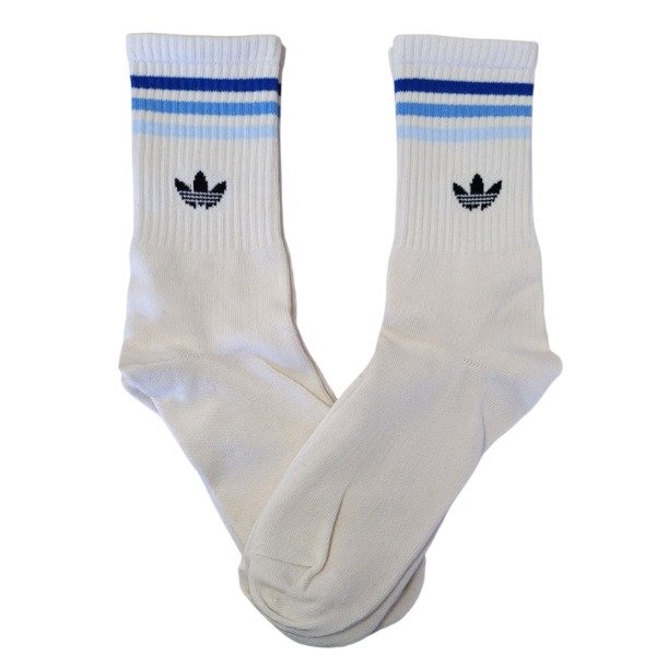 Producto - Adidas clasica cremita tonos celestes