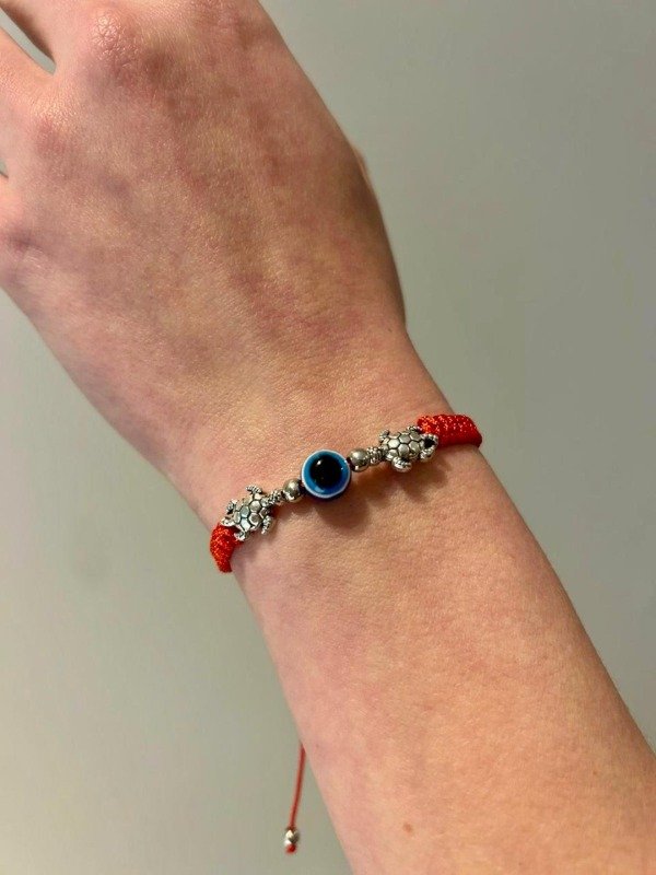 Producto - Pulseras hilo rojo con tortugas y ojo turco nudo corredizo por docena