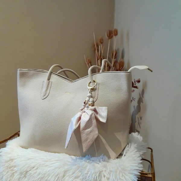 Producto - Cartera Sakali con charm con moño - 0