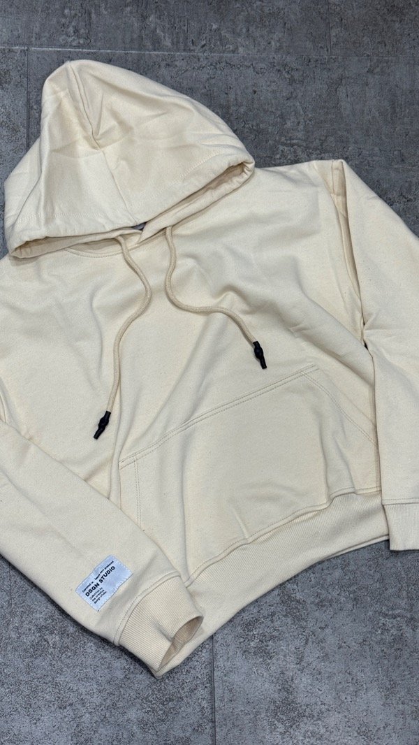 Producto - Buzo beige etiqueta