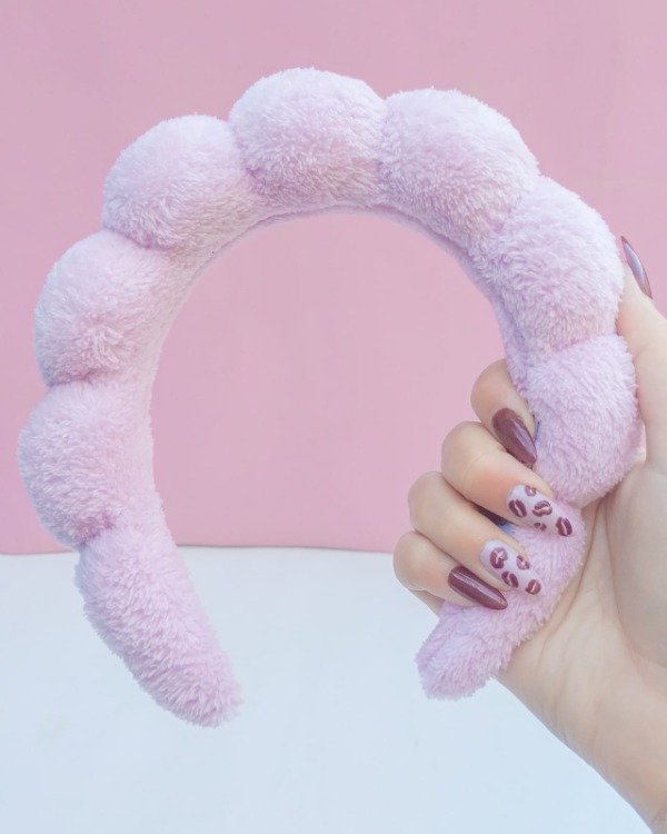 Producto - Vincha skincare rosa peluche