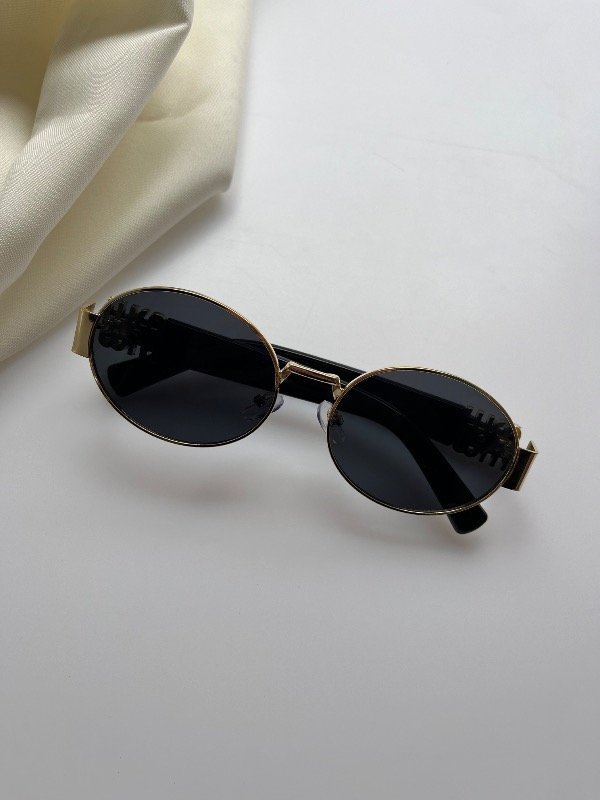Producto - Lentes Miu Miu Negro Dorado