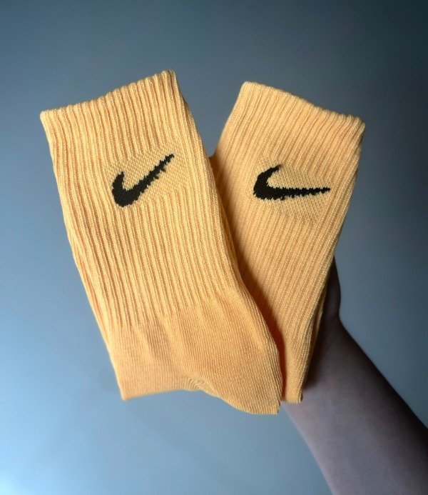 Producto - Media caña nike amarilla