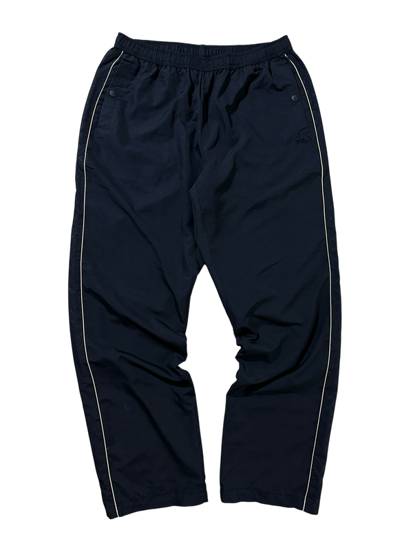 Producto - PANTALON ROMPEVIENTOS FILA BAGGY T:M/L