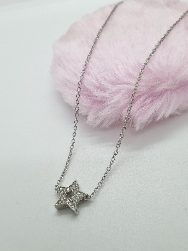 Producto - Cadena acero quirúrgico dije estrella centro calado pasante
