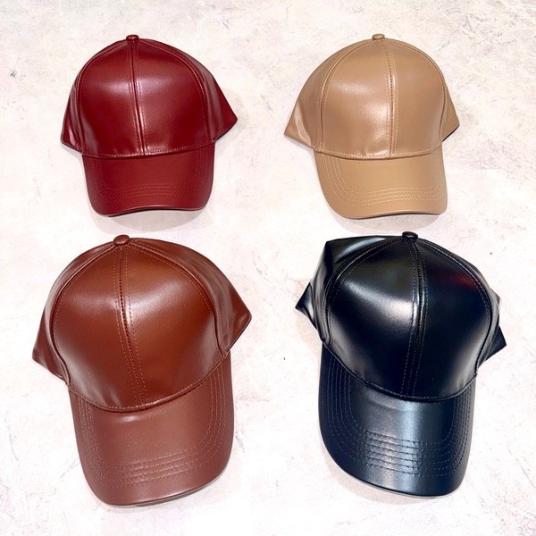 Producto - Gorras de cuerina
