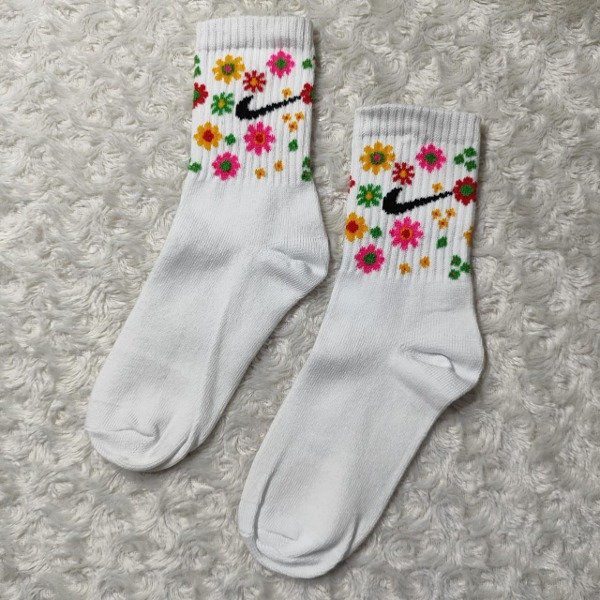 Producto - NIKE FLORES