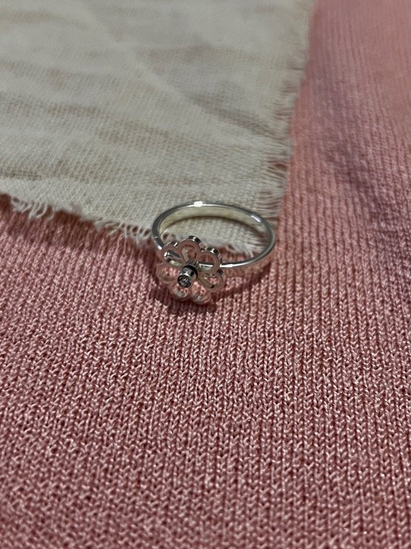 Producto - anillo flor giratorio