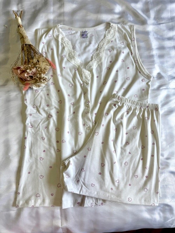 Producto - Pijamita oversize con botones rosa