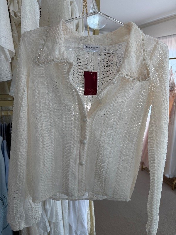 Producto - Blusa tejida con perlas