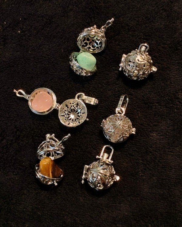 Producto - Relicarios con baño de acero