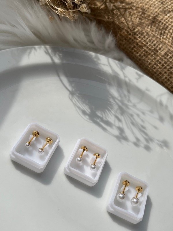 Producto - Abridores de acero dorado con perlas