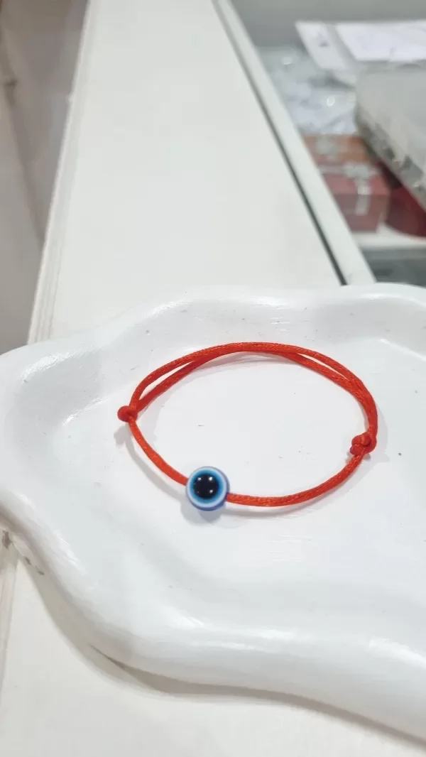Producto - Pulsera nudo corredizo roja con ojo