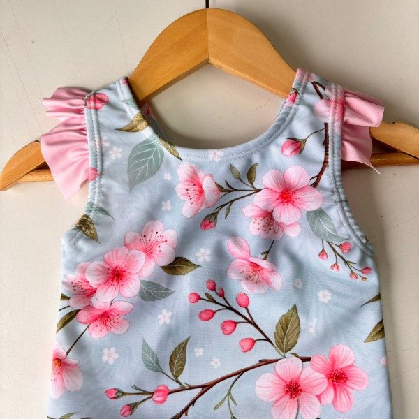 Producto - MALLA ENTERIZA (UV) - 2025 - FLORES (CELESTE)