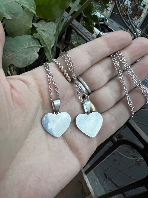 Producto - 2 collares corazón de acero