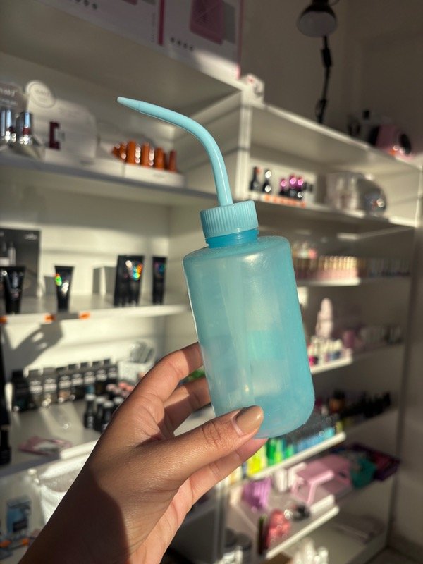 Producto - Limpiador de pestañas botella pico curvo