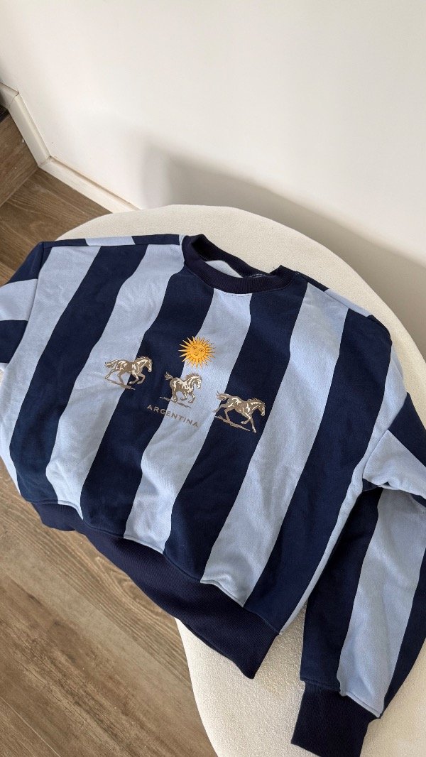 Producto - BUZO FRISA CABALLOS