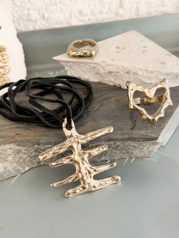 Producto - DIJE BONE