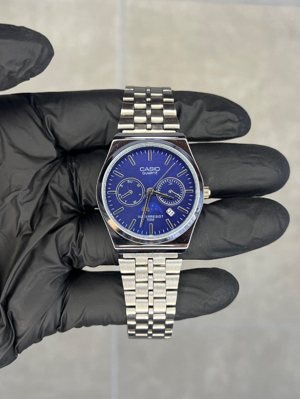 Producto - CASIO 12 PLATA AZUL (premium)