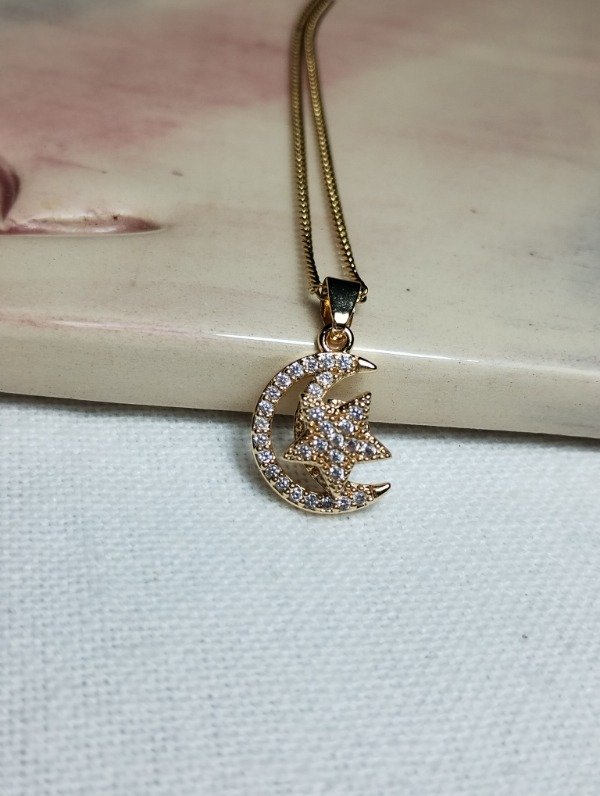 Producto - Cadena dije luna estrella giratoria