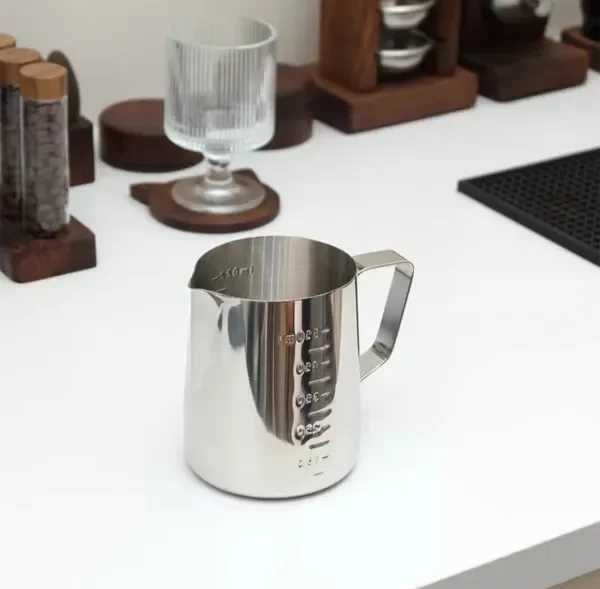 Producto - JARRA LECHE MEDIDOR DE ACERO