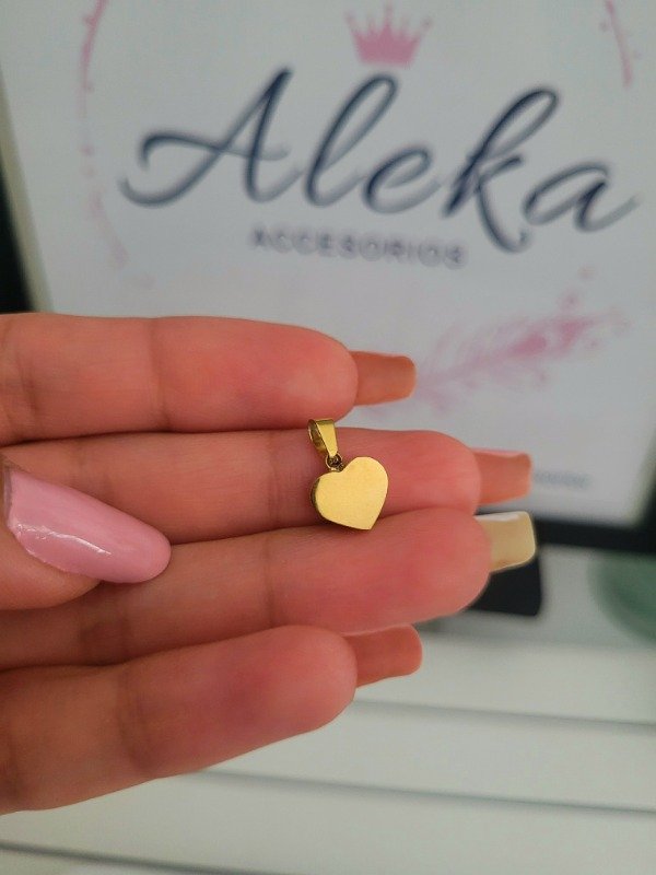 Producto - Dije corazón macizo de acero dorado - 0