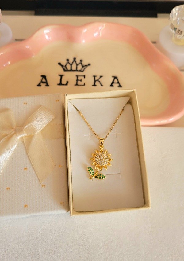 Producto - Collar girasol giratorio de acero dorado