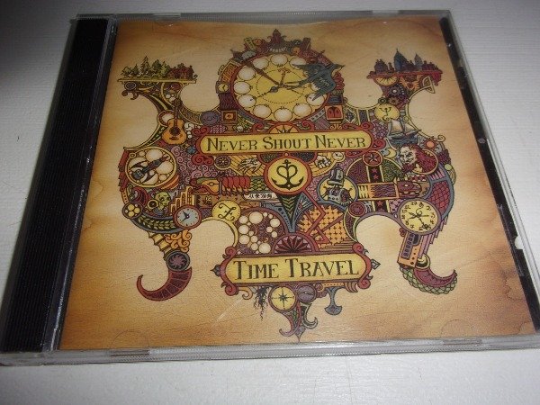 Producto - CD NEVER SHOUT NEVER TIME TRAVEL DIFUSION ARG 36E - 0