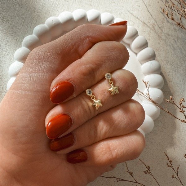 Producto - Aro pasante stras mini con dije colgante de estrellas dorada