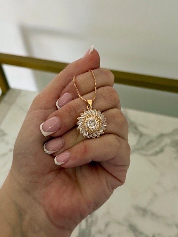 Producto - Cadena con dije SOL acero dorado