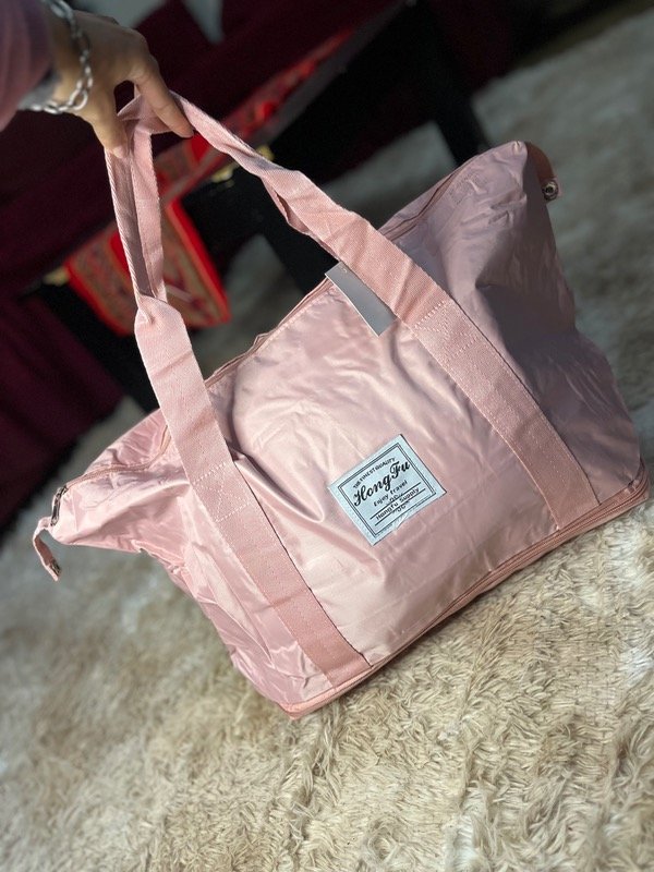Producto - Bolso impermeable rosa