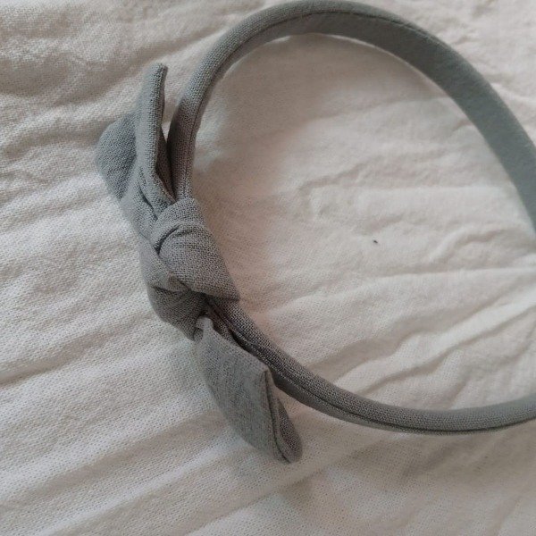 Producto - Vincha con moño verde seco