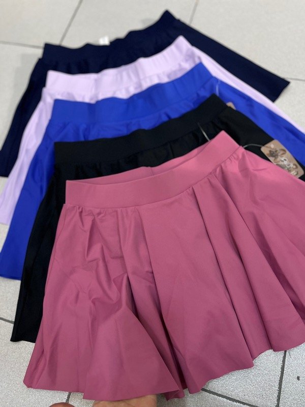 Producto - Pollera deportiva tablas con calza portacelular