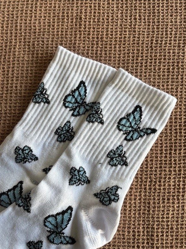 Producto - Mariposas celeste base blanca