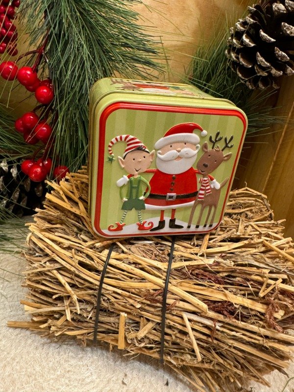 Producto - Lata verde Papá Noel y sus amigos (Efectivo: 7.920)