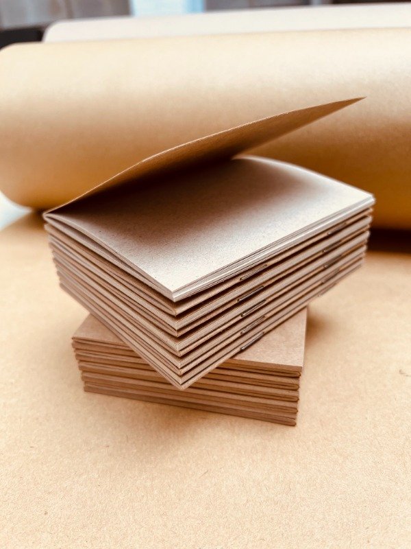 Producto - CUADERNO ABROCHADO LISO A5 x 10 UN. - 2