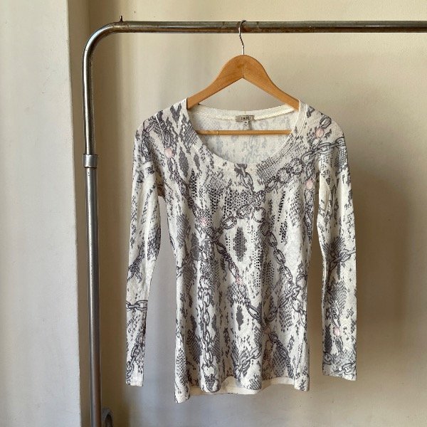 Producto - Cache manga larga con brillos tipo sweater liviano