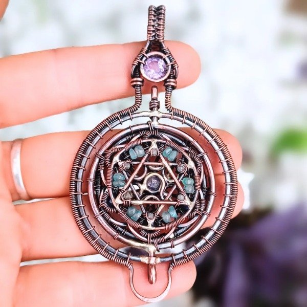 Producto - Medallón movible geometría sagrada