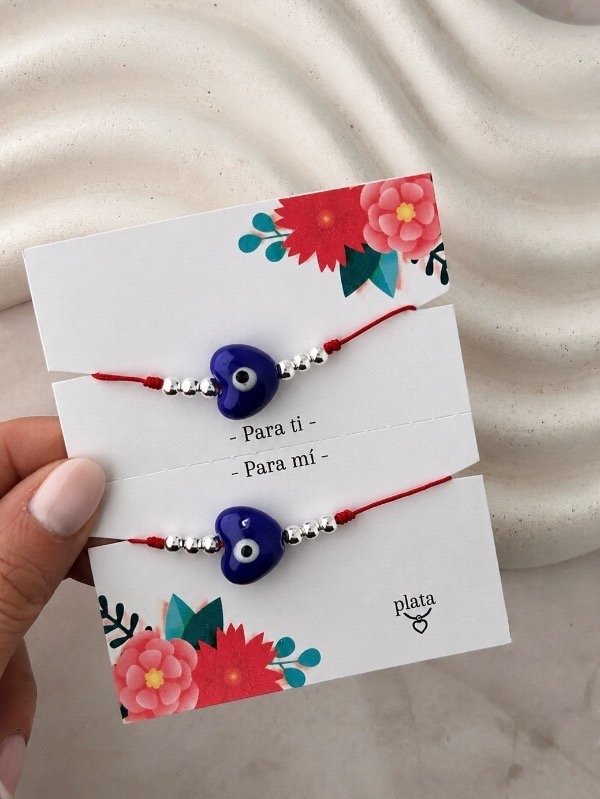 Producto - SET 2 PULSERAS REGULABLES BOLITAS DE PLATA Y OJO TURCO DE CERÁMICA 0017
