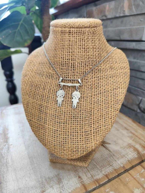 Producto - Collar dos varones y percha. Acero quirúrgico.