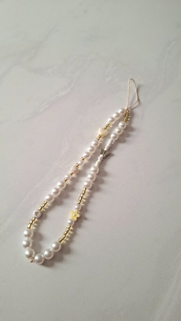 Producto - Strap Phone flor amarilla