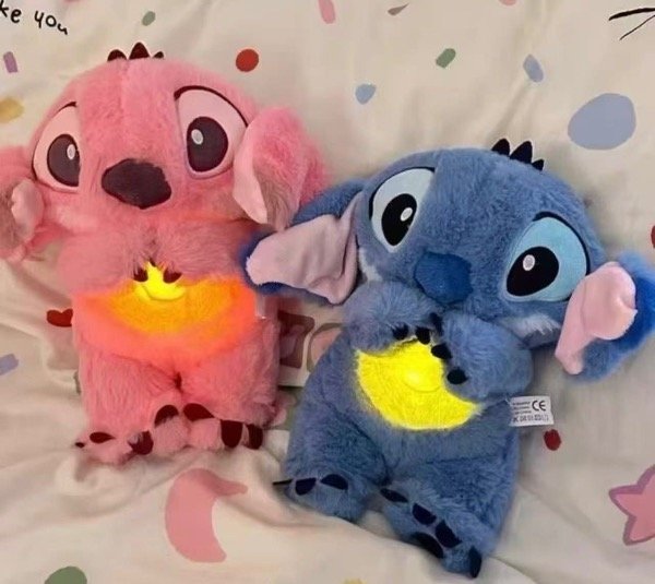 Producto - Peluche Stitch de apego respira, luz y sonido (azul)